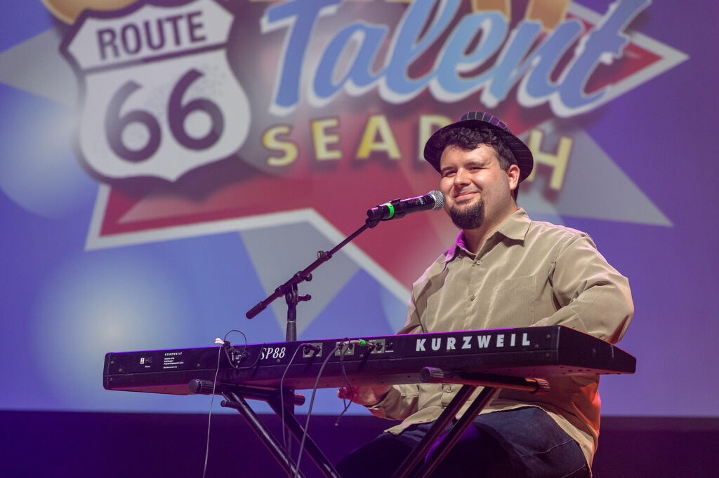 Luke Cooksey plays his keyboard on stage at the great Route 66 talent search