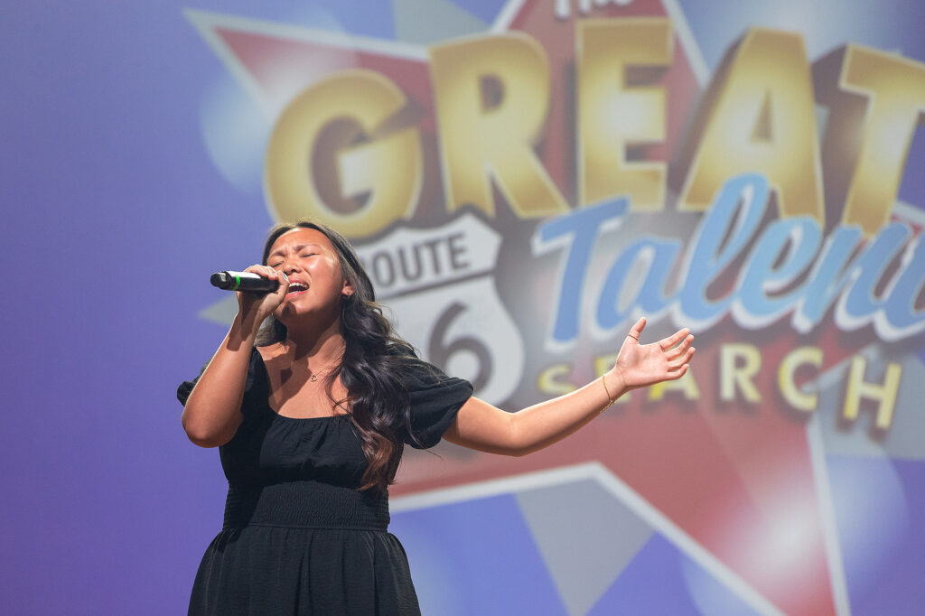 Anastasia Vang sings on stage at the great Route 66 talent search